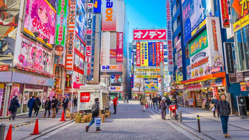 Akihabara is one of Tokyo's busiest shopping streets. As the sun was going  down, only small streaks of light could pass through the tighly… | Instagram